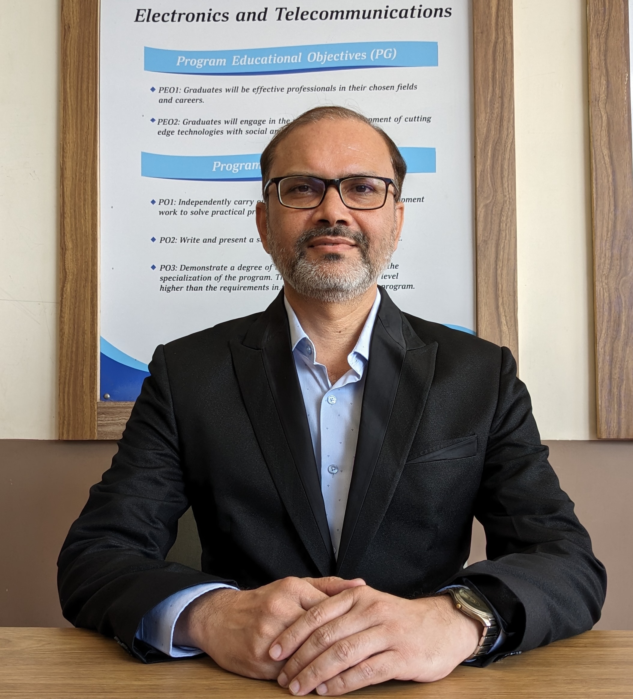 Dr. Anand Mane